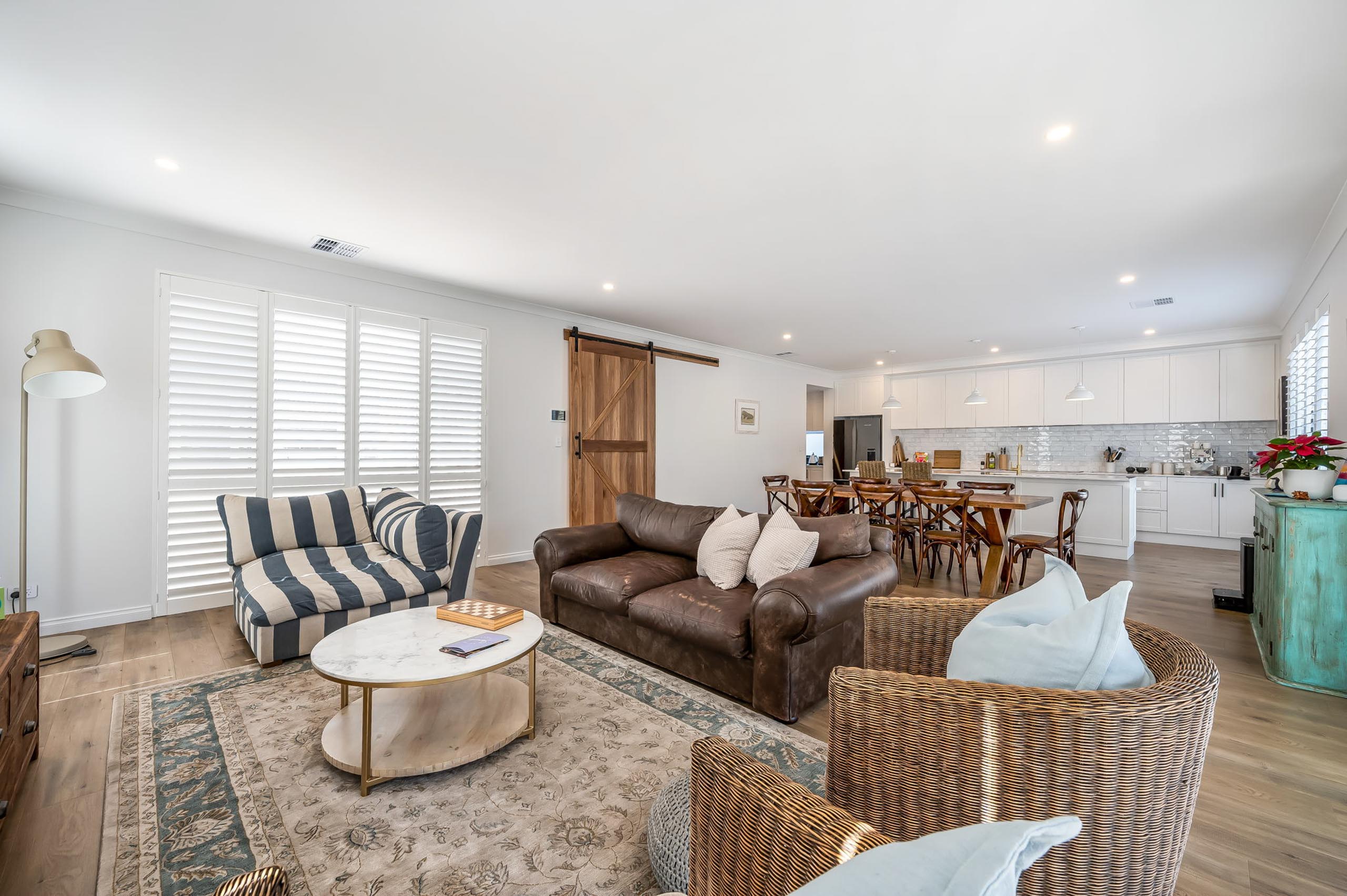 Hampton style living room and kitchen Lockleys