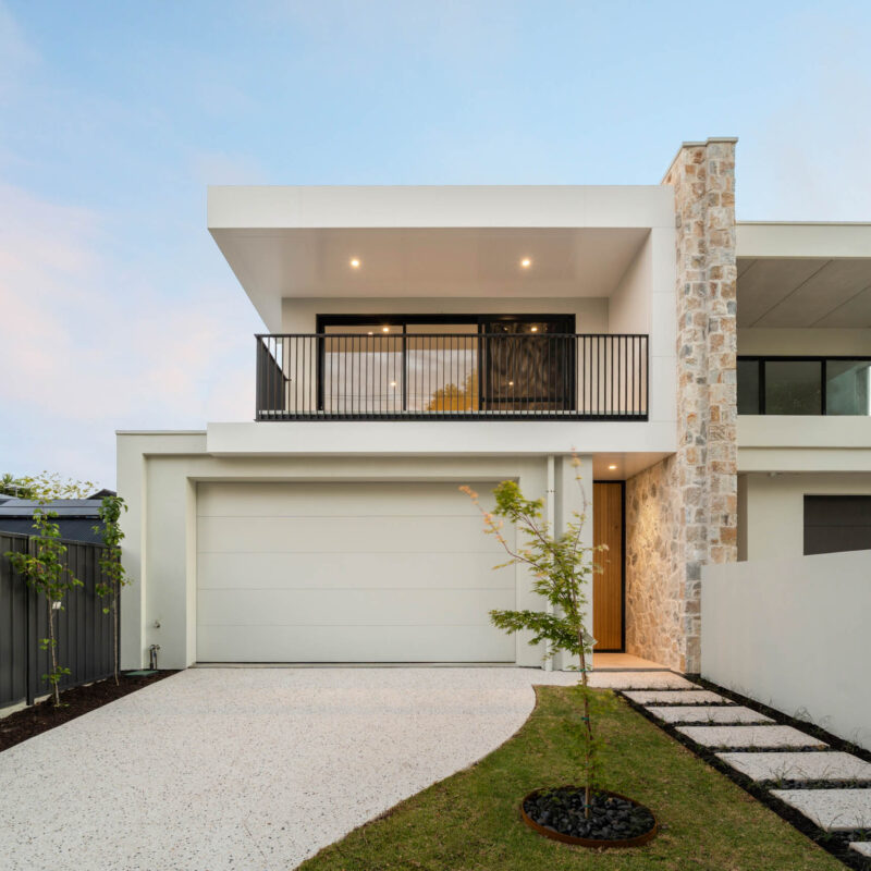 Modern custom built new home in Henley Beach, Adelaide with balcony, stone façade and double garage by MyHomeBuild