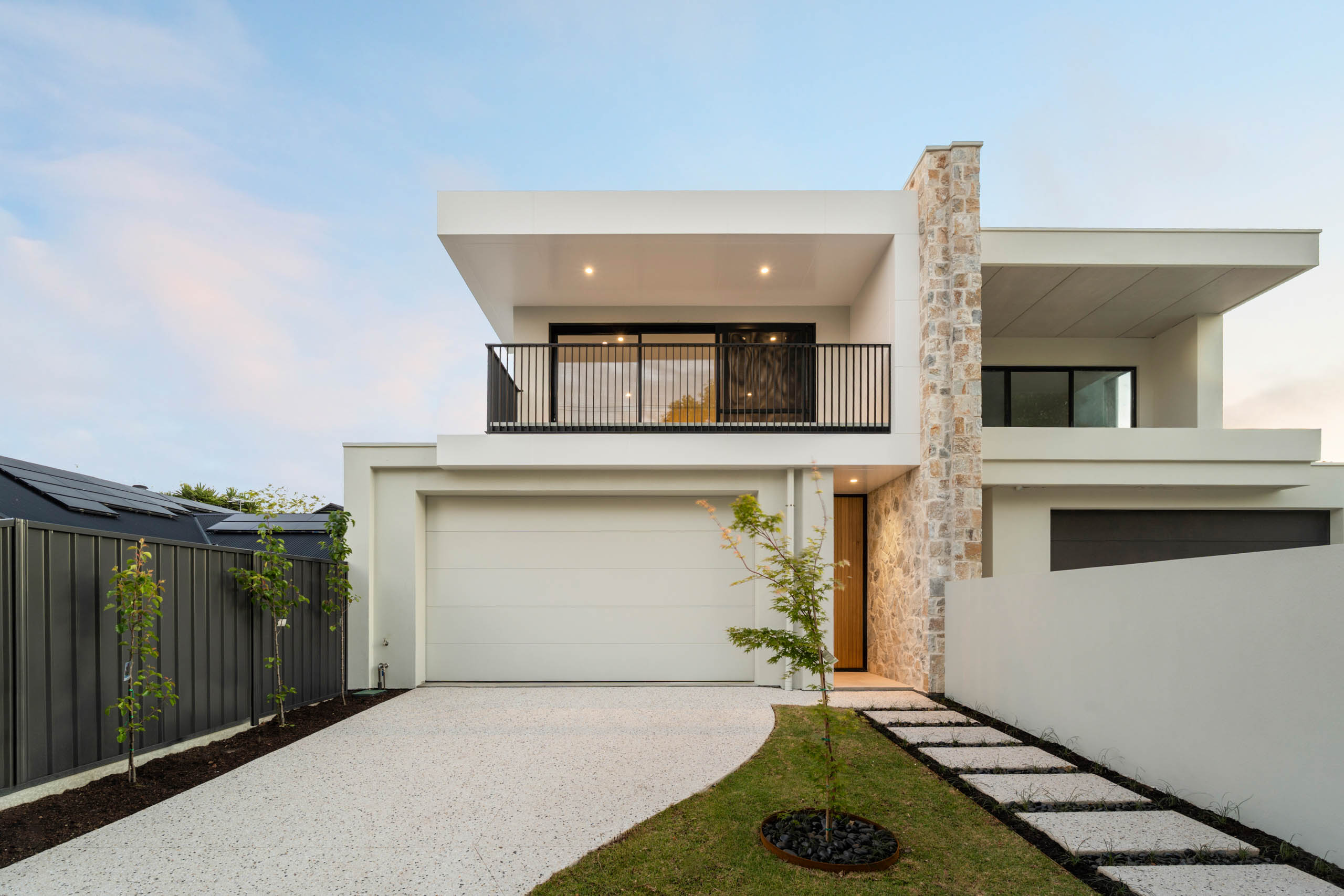 Modern custom built new home in Henley Beach, Adelaide with balcony, stone façade and double garage by MyHomeBuild